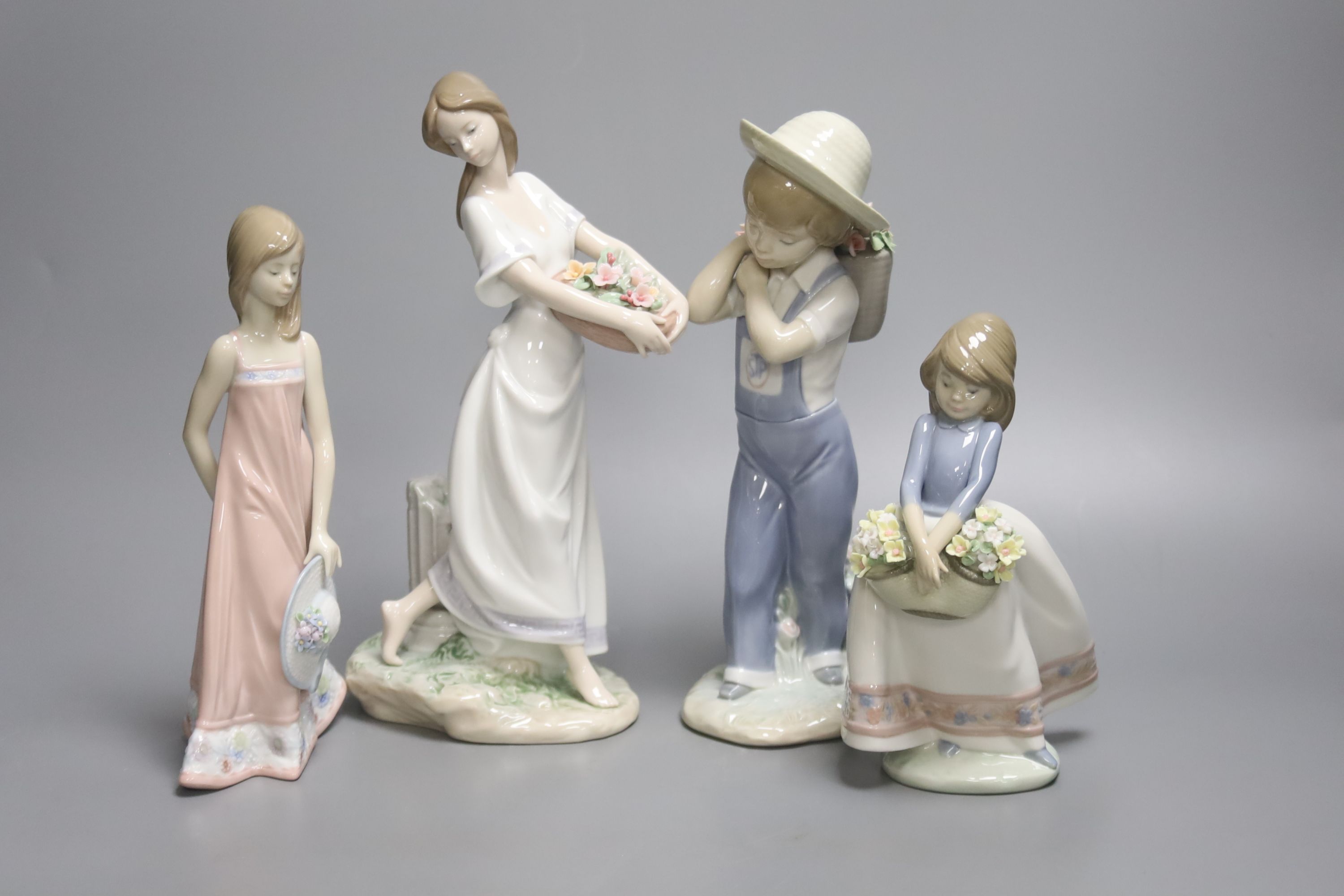A Lladro figure of a boy 